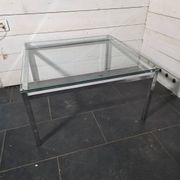 Chrome metal coffee table with a glass top from the 1970s.