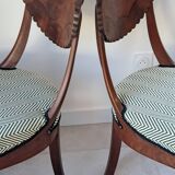 Pair of mahogany gondola chairs – Empire style – 20th century, restored