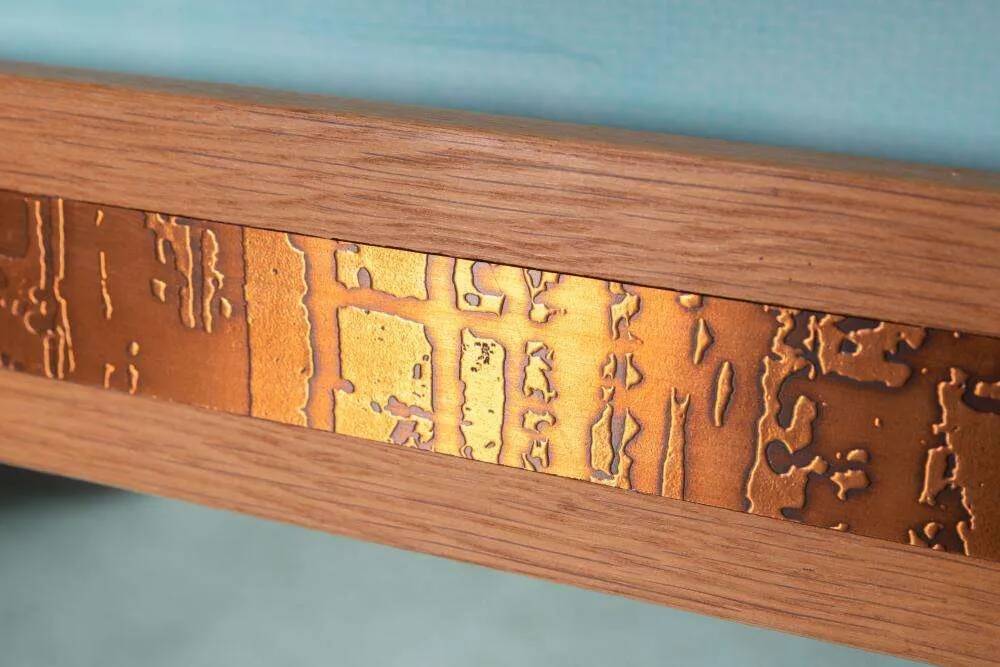 Vintage Danish wall mirror design from the 1960s in oak and stamped brass.