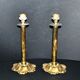 Lot of 2 antique brass and gilded bronze candle holders with acanthus decoration.