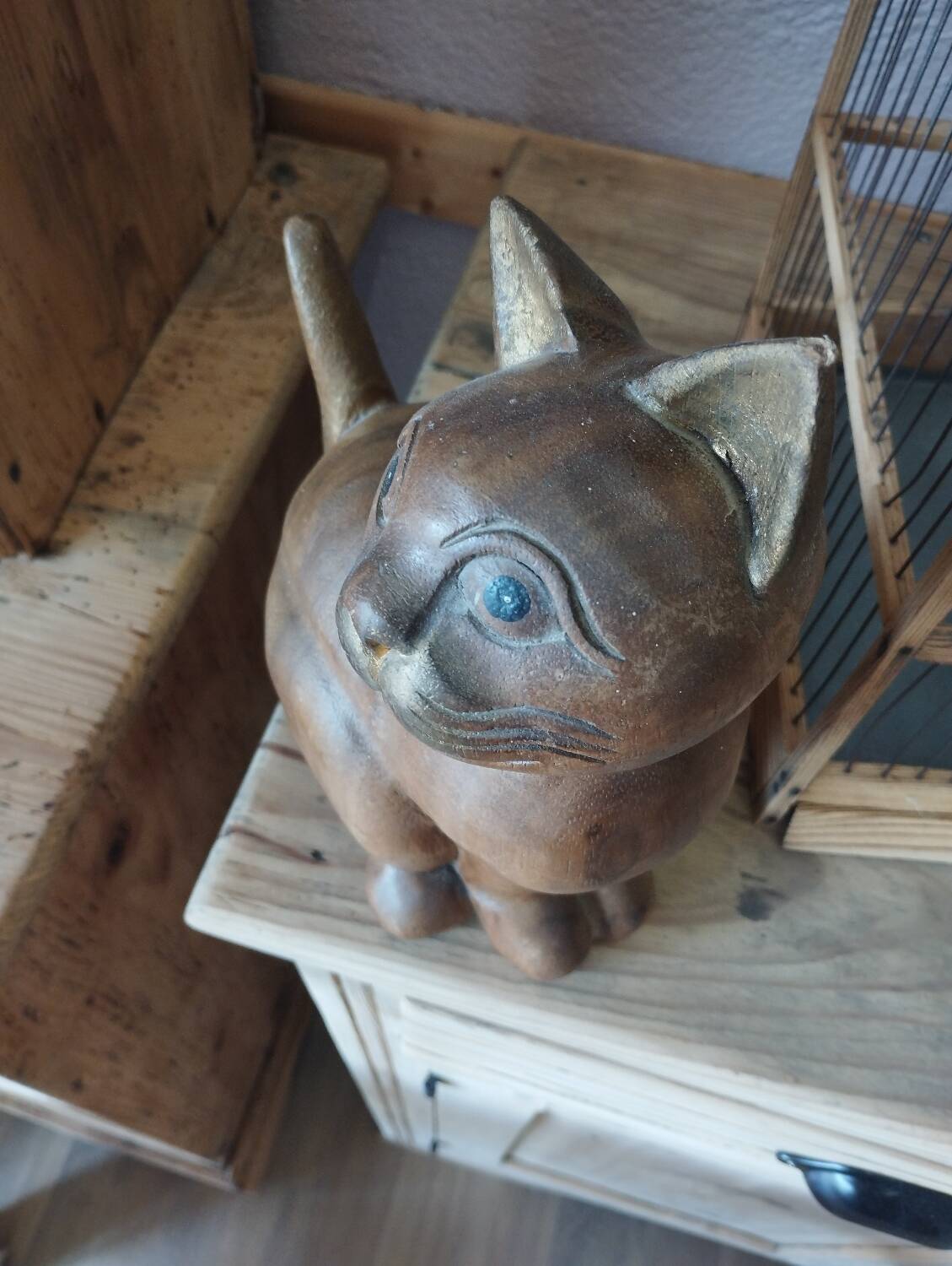 Wooden cat sculpture