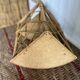 Corner shelf in rattan