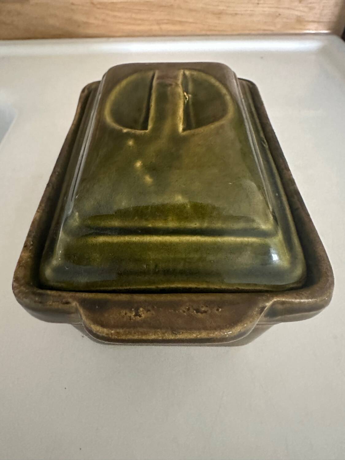 Vintage green majolica butter dish