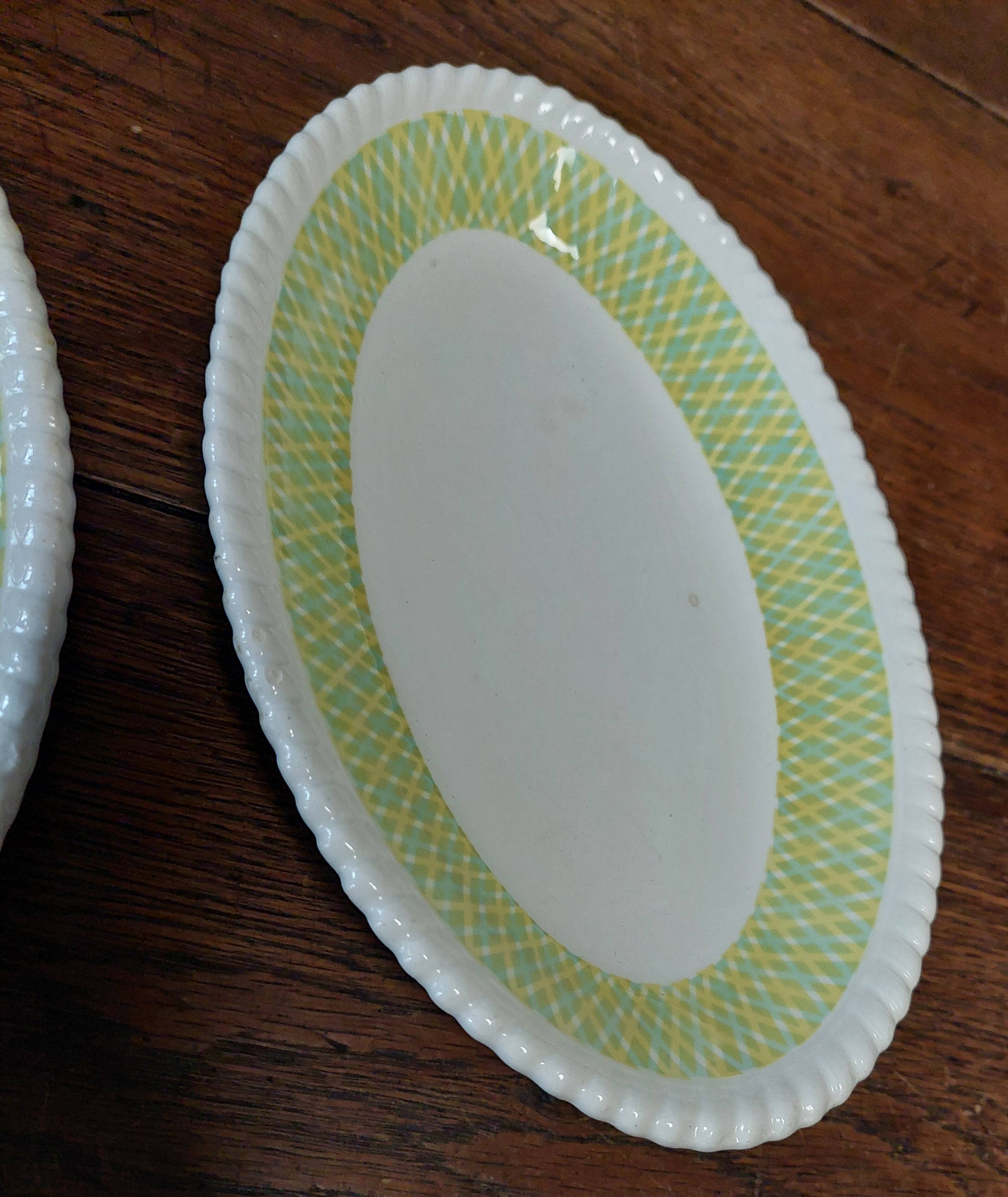 Pair of Badonviller iron earthenware dishes, Amina model