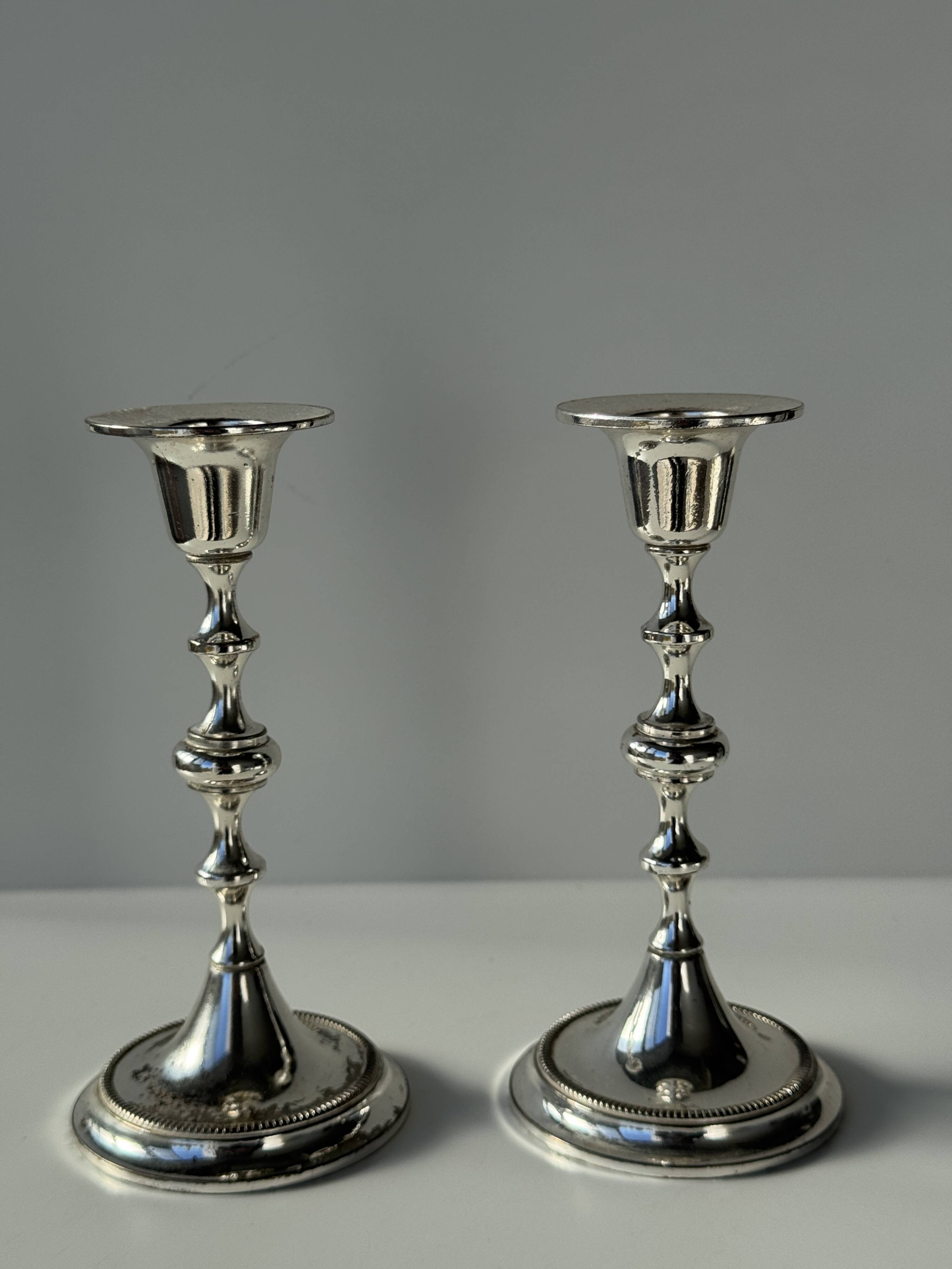Pair of small silver candlesticks
