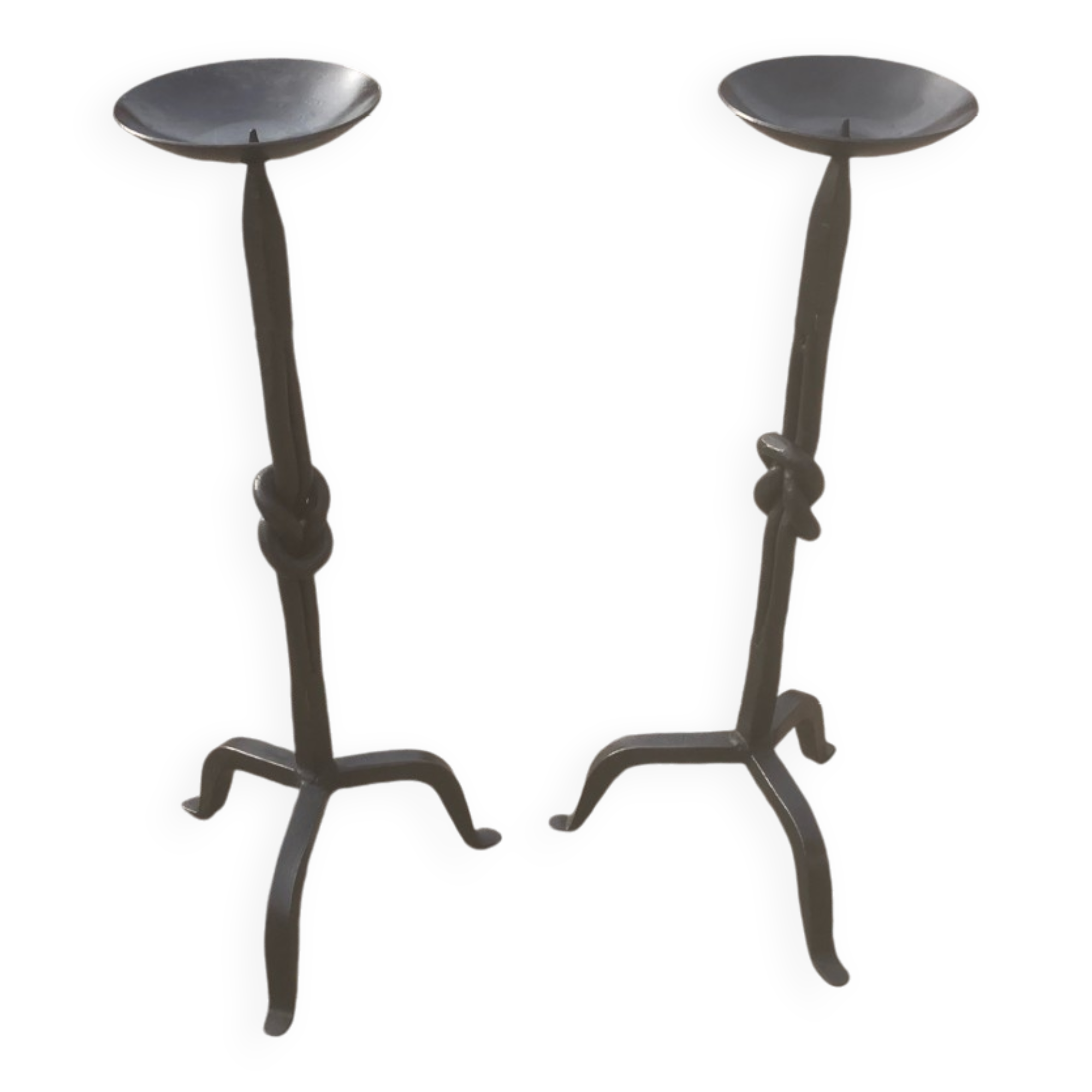 Pair of wrought iron candlesticks
