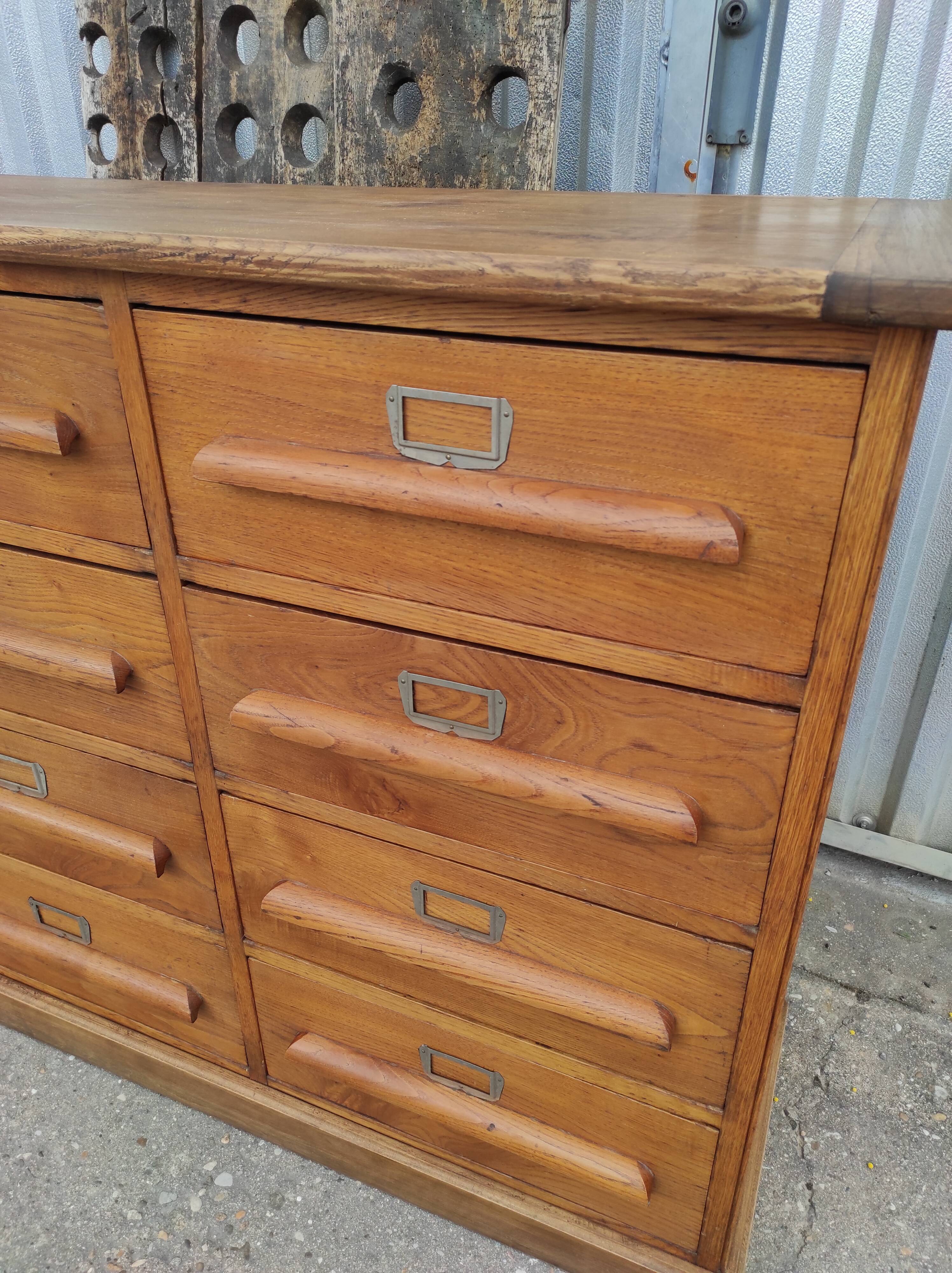 Trade furniture with 12 drawers in gilded oak