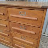 Trade furniture with 12 drawers in gilded oak