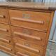 Trade furniture with 12 drawers in gilded oak