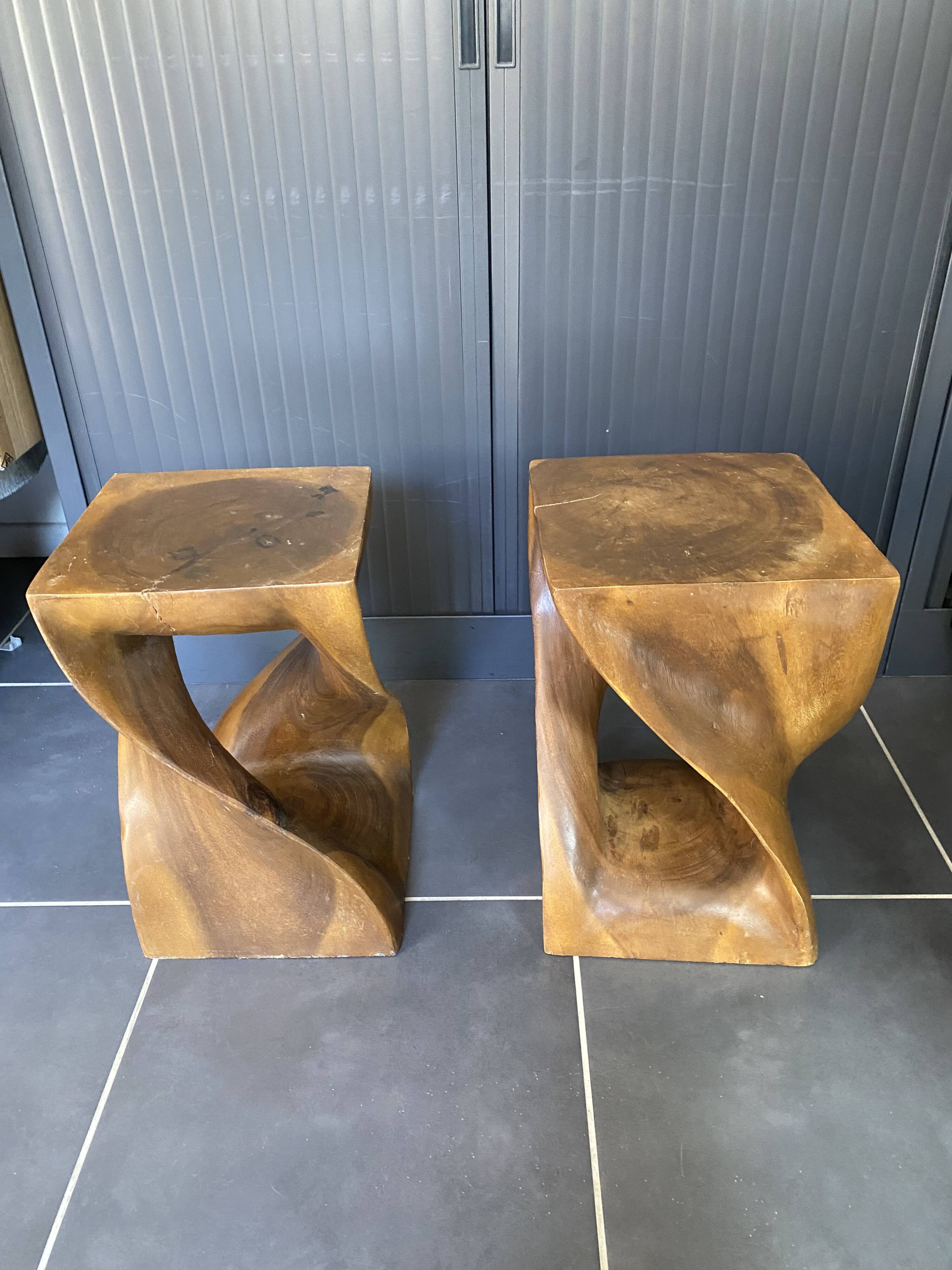 Stool n2 in solid raw walnut wood carved from the mass 1970