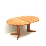 Vintage extendable pine dining table made in the 1970s