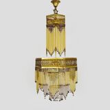 Art Nouveau style bronze chandelier with yellow and mauve pendants, 11 lights. 1960s