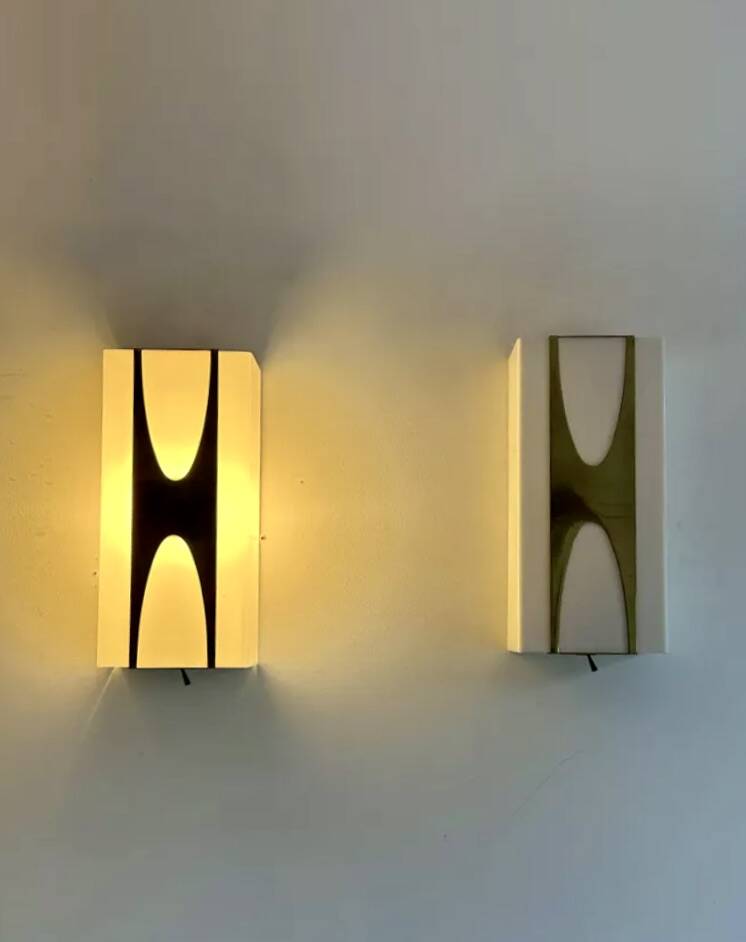 Pair of Loewy wall lights for Hilton, brass and Perspex, France 1965