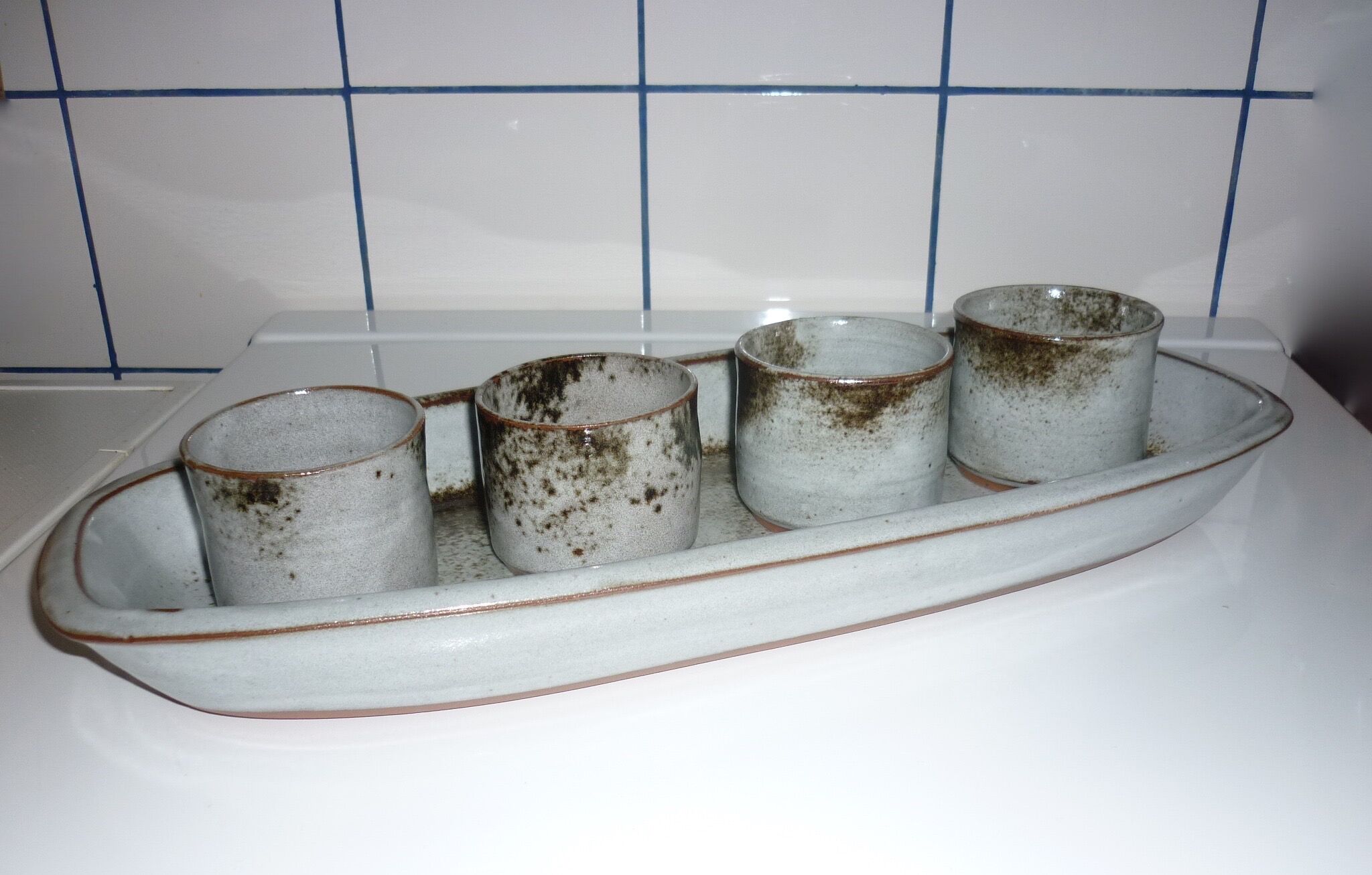 Ceramic fish dish and 4 pots for sauces from the 1960s