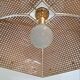Plexiglass and Vienna straw chandelier.