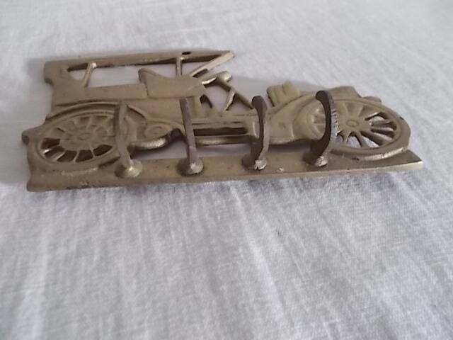 Tea towel holder or brass wall key holder in jalopy shape