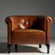 Ensemble de 2 fauteuils club en peau de mouton