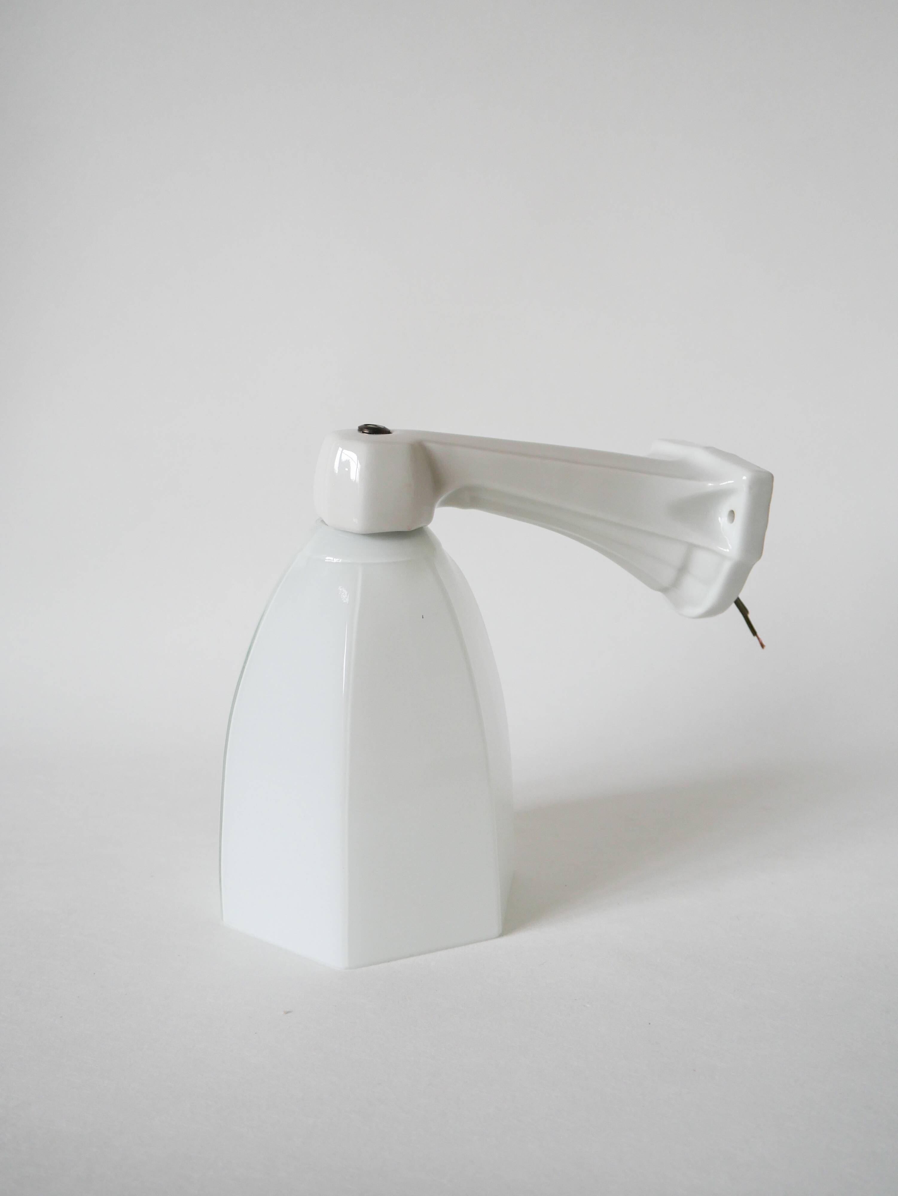 graphic art deco wall light and 20th century porcelain support