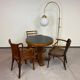 Art Deco game table with a black glass top.