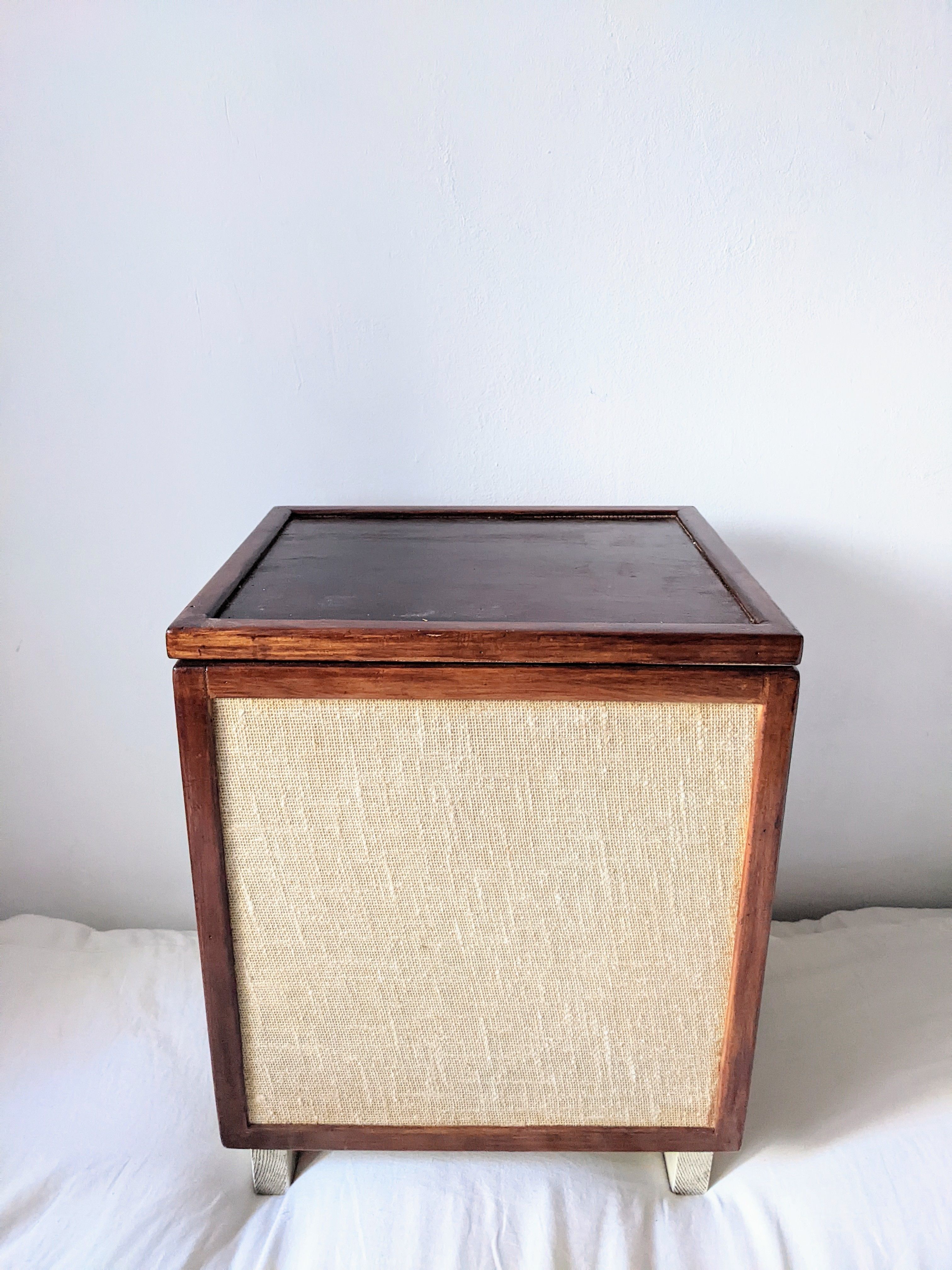Burlap chest and varnished wood
