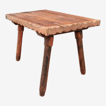 Raw hammered side table