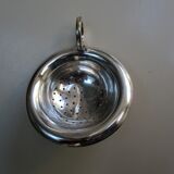 Silver metal tea strainer