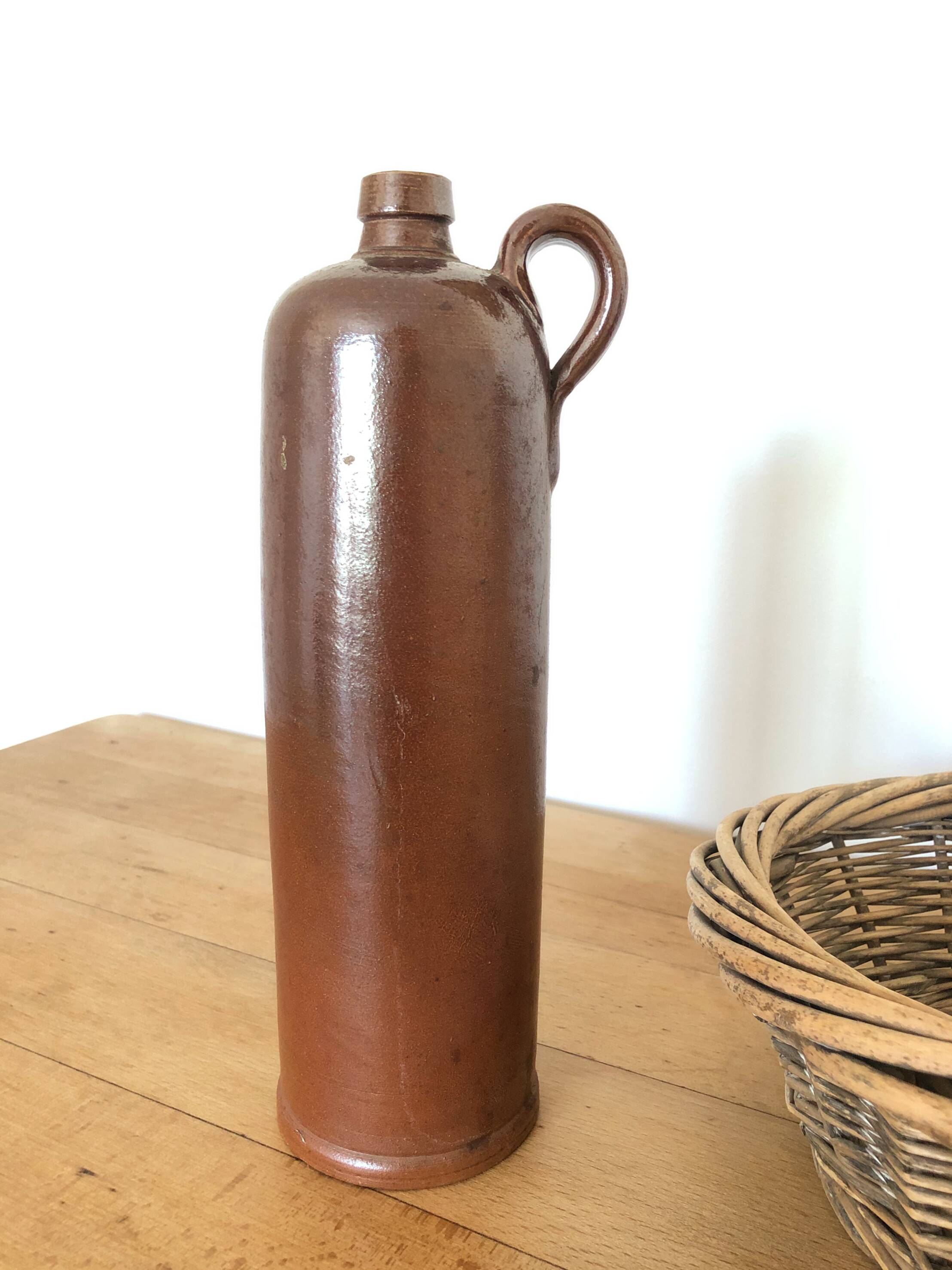 Set of 5 antique glazed stoneware bottles