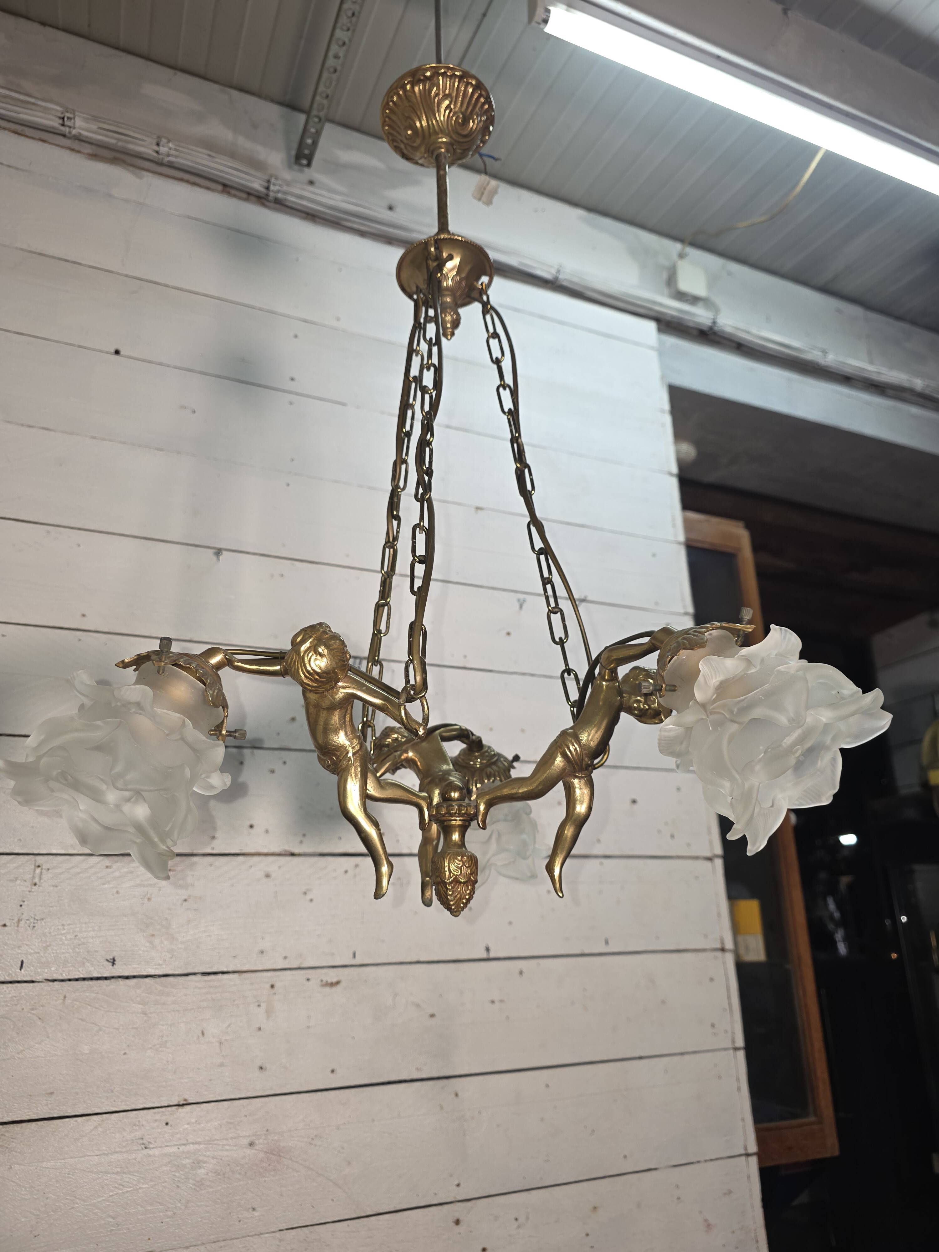 Bronze cherub chandelier from the 1970s.