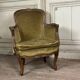 Pair of louis xv style armchairs in carved beech around 1920