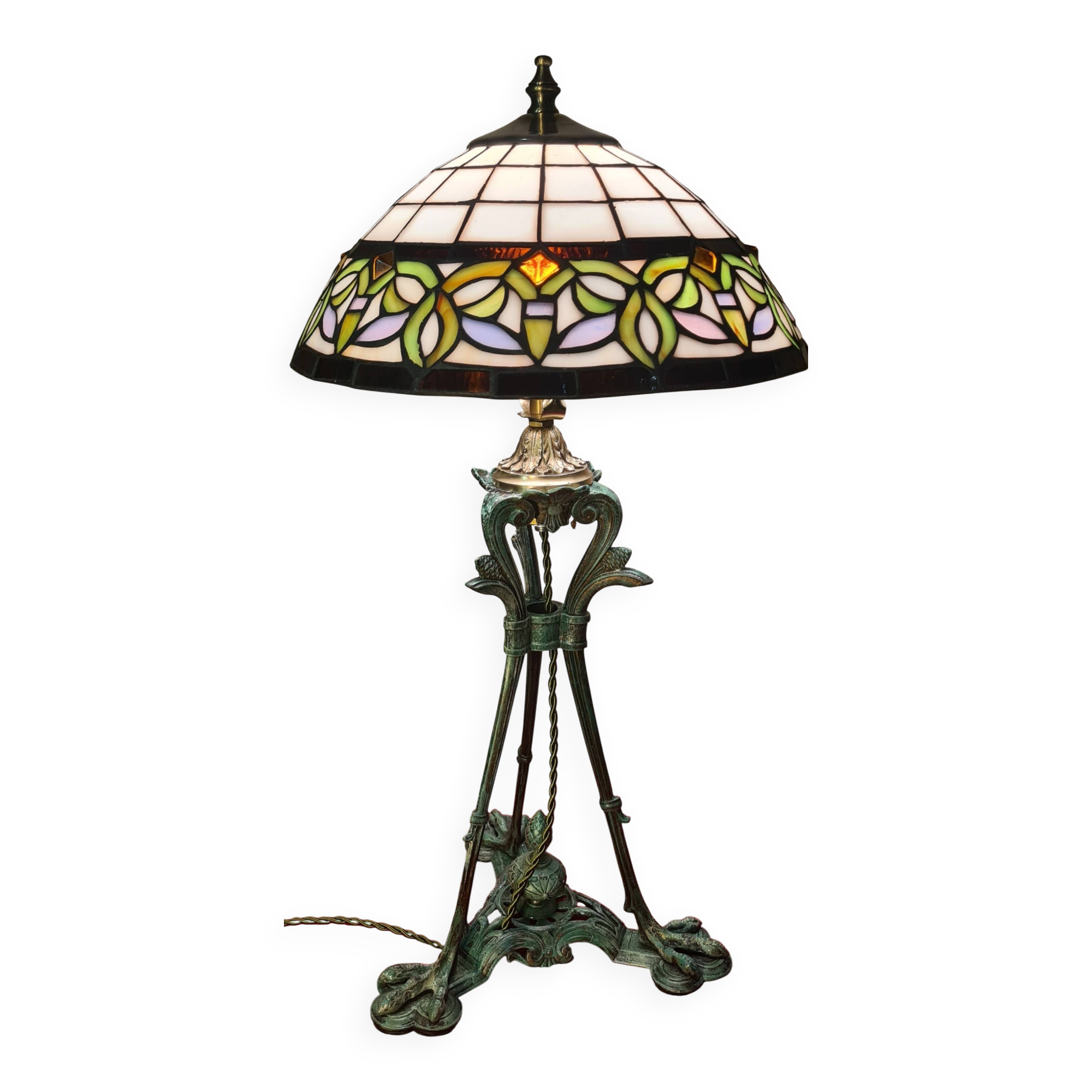 Antique patinated bronze regulator lamp with Tiffany glass shade in very good condition