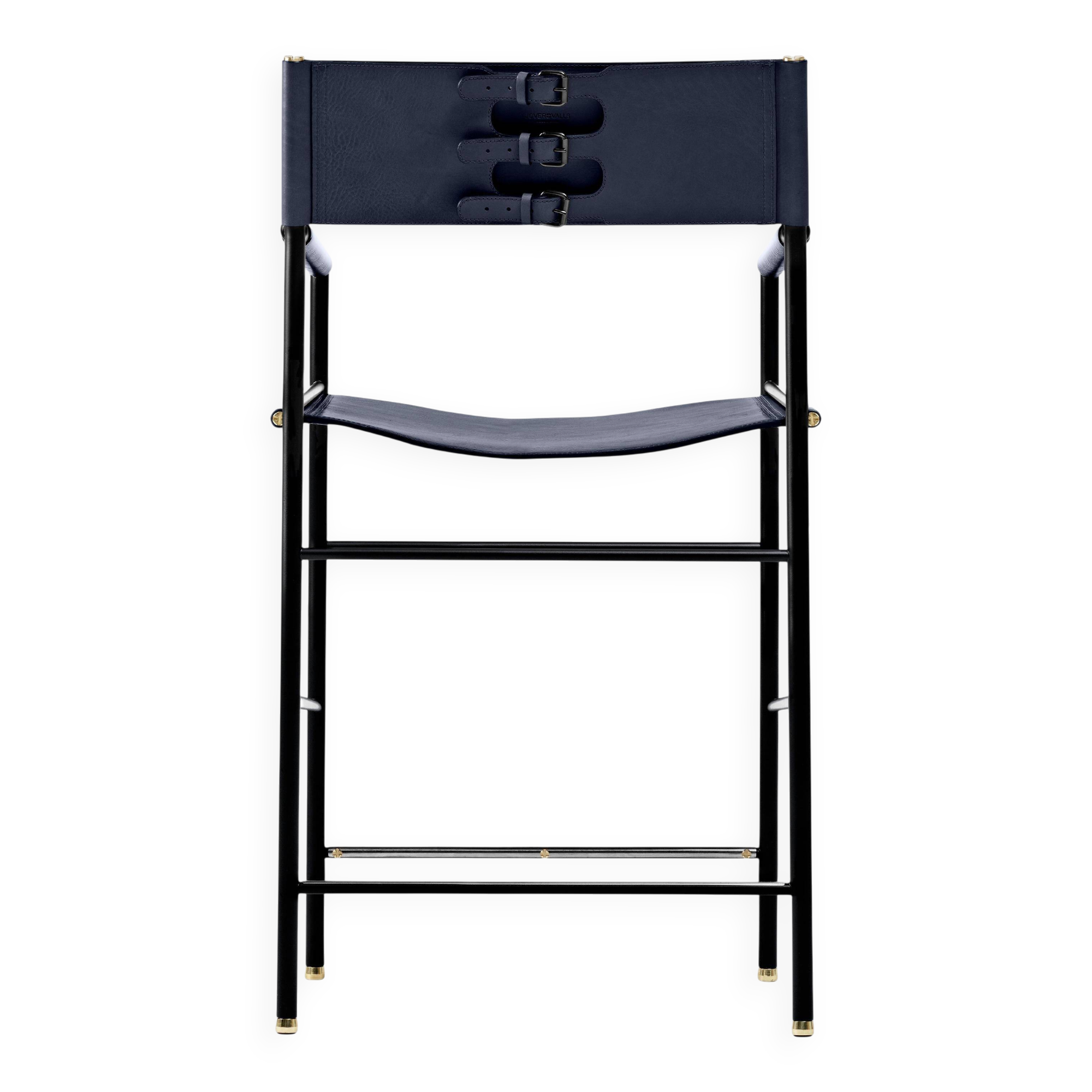 Contemporary classic bar stool with a navy blue leather backrest and black rubber metal.