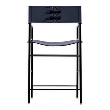 Contemporary bar stool with navy blue leather backrest and black rubber metal.