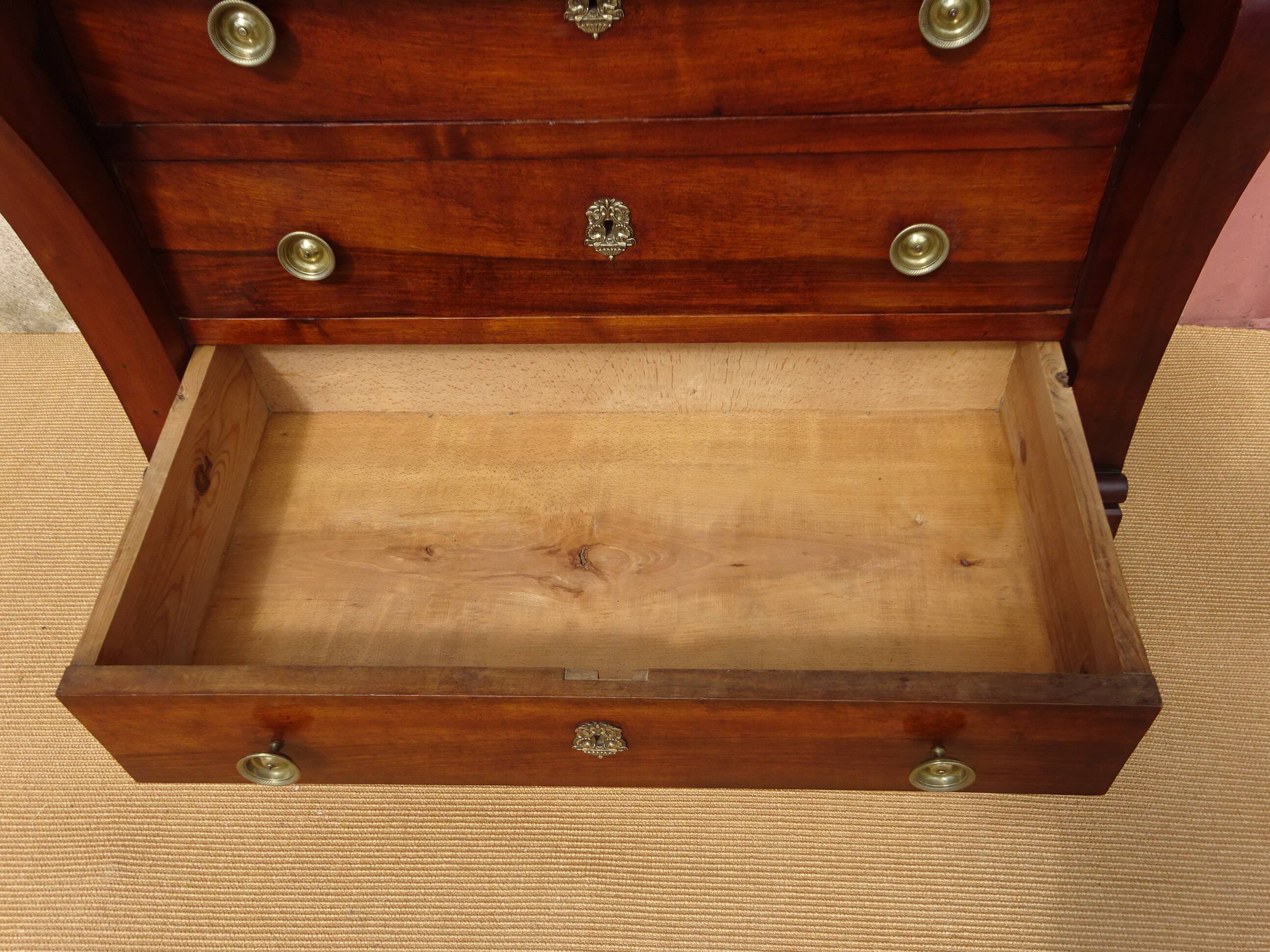 Antique solid walnut chest of drawers with scrolls