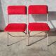 Pair of folding chairs in vintage red moumoute