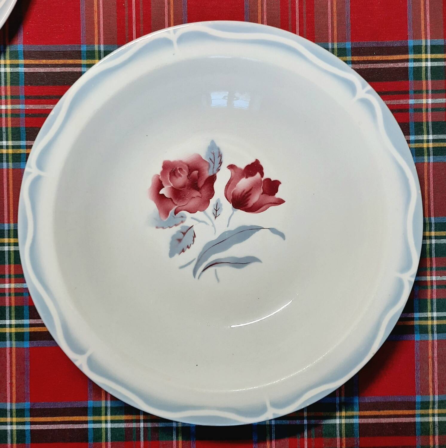 Mismatched antique flat plates in earthenware accompanied by a deep dish.