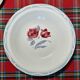 Mismatched antique flat plates in earthenware accompanied by a deep dish.