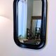 Miroir vintage noir aux angles arrondis