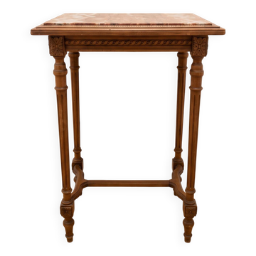 Classic wooden console with veined marble top.