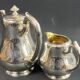 Silver-plated coffee pot and milk jug monogrammed MA, signed CHRISTOFLE.