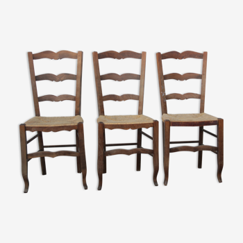 3 straw chairs