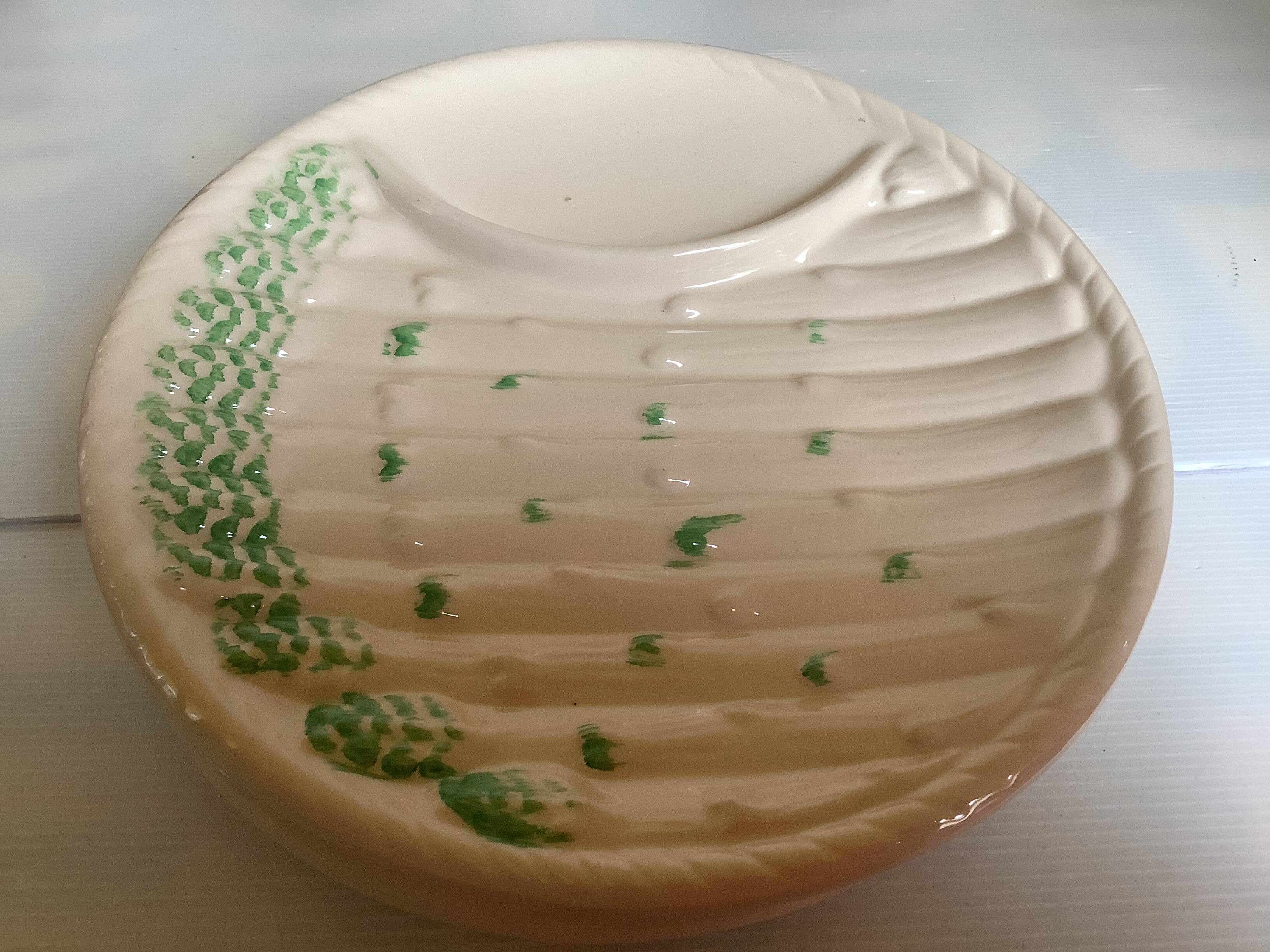 Six antique asparagus plates