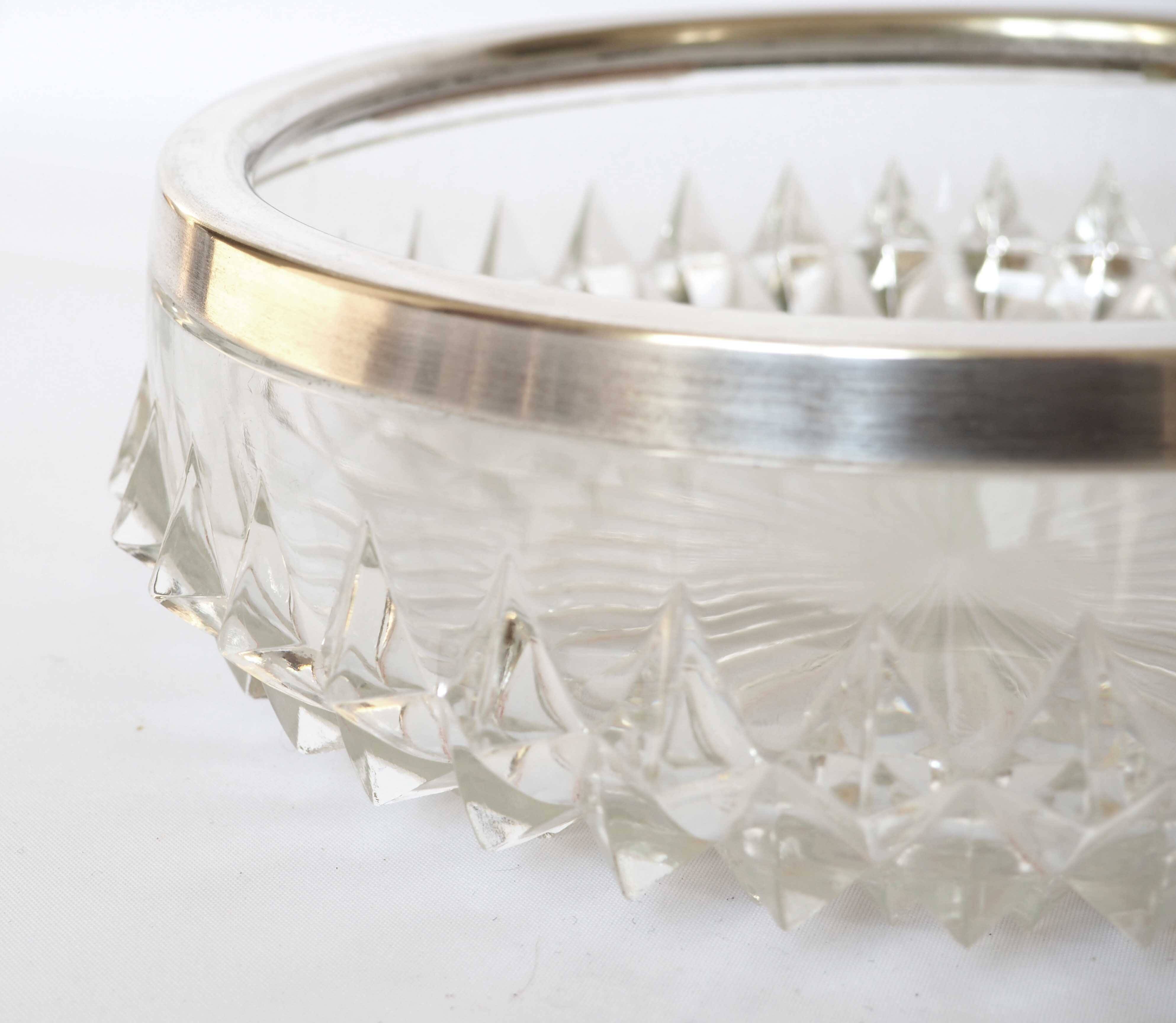 Silver rimmed glass empty pocket