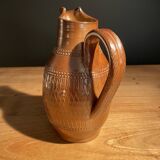 Chiseled terracotta pitcher