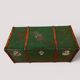 Vintage wooden and metal green travel trunk, circa 1930.
