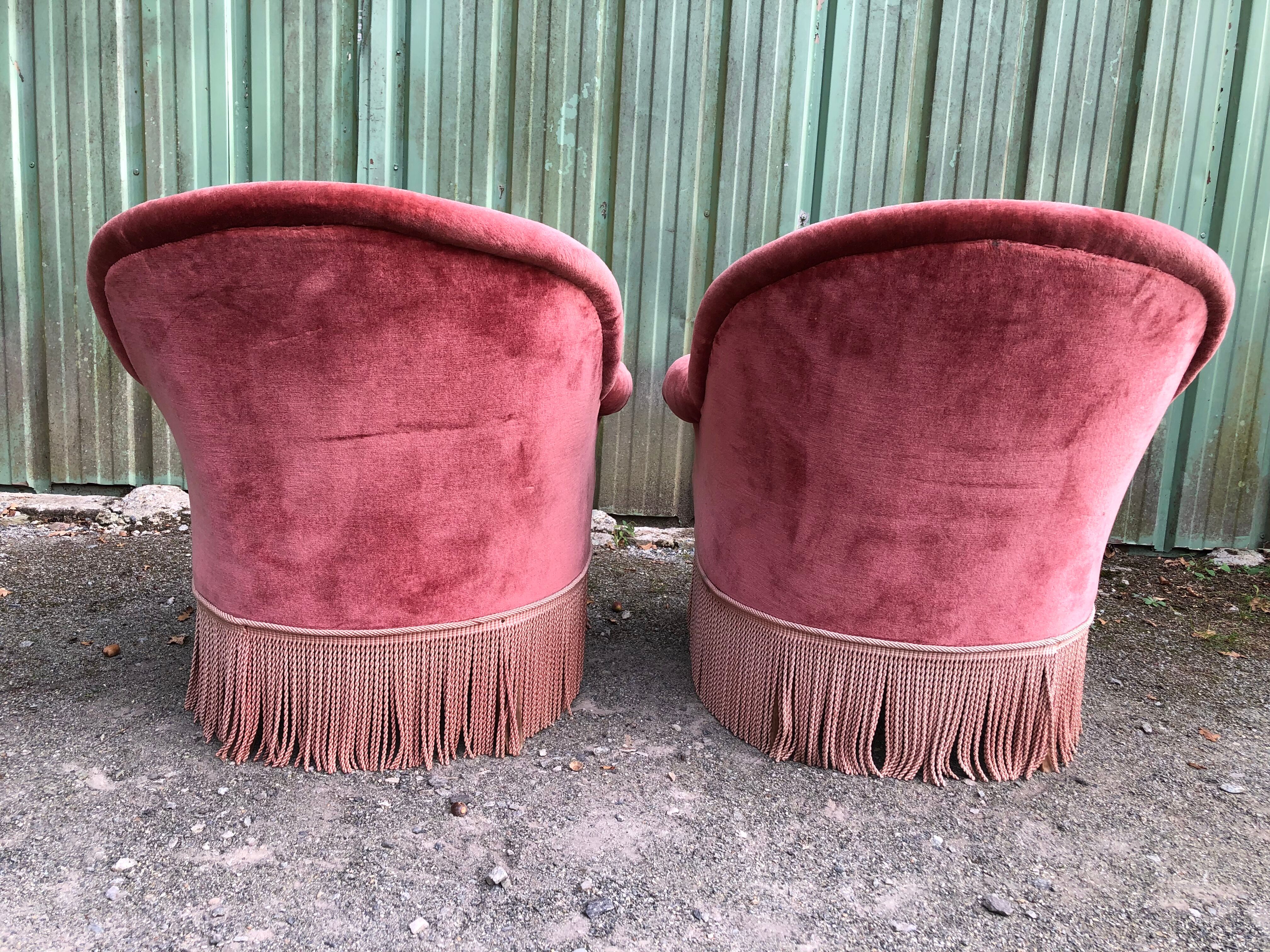 Duo de fauteuils vintage crapaud en velours saumon