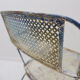 Vintage perforated metal armchair from the 1950s.