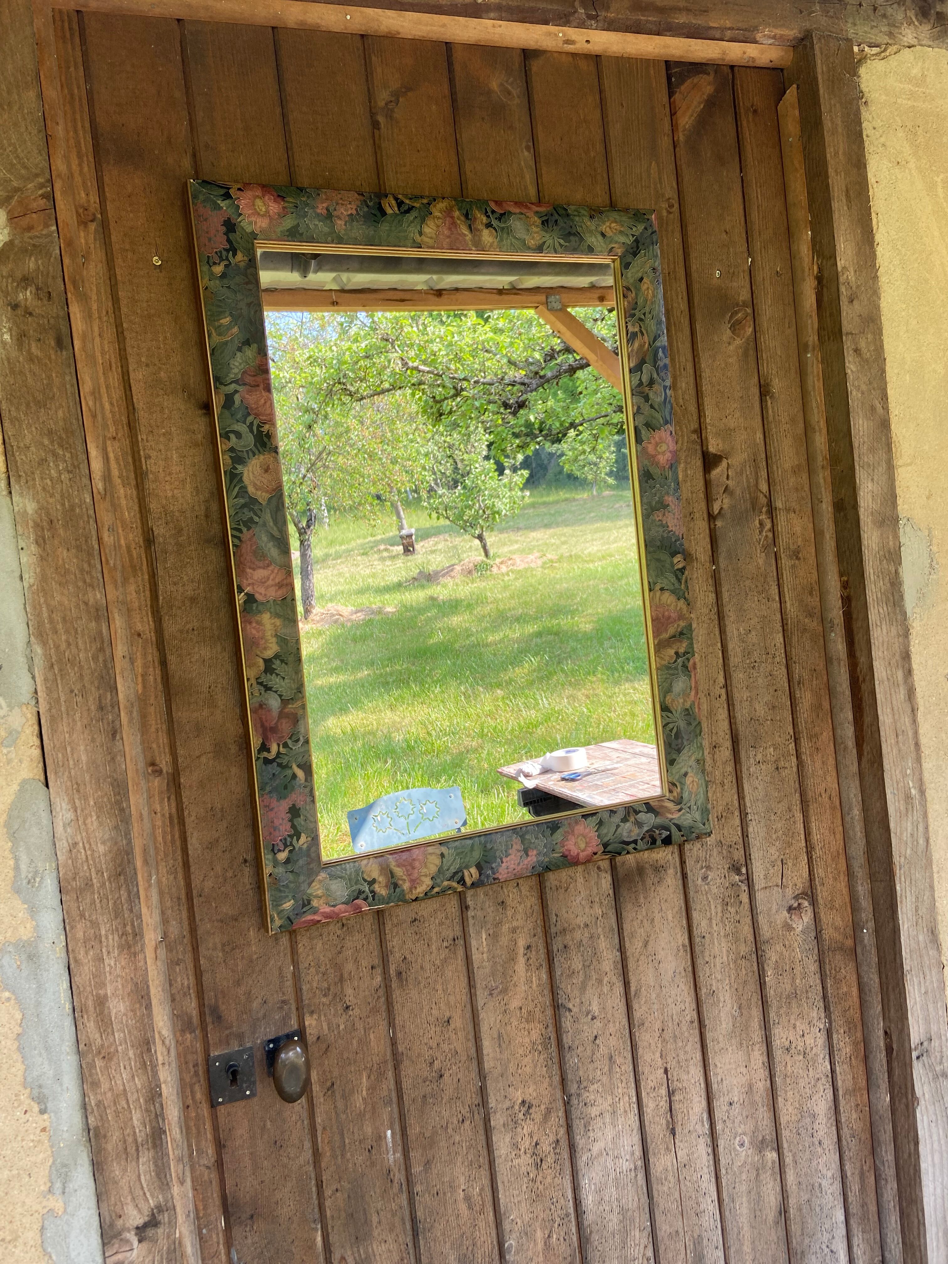 Wooden mirror, painted flower outline
