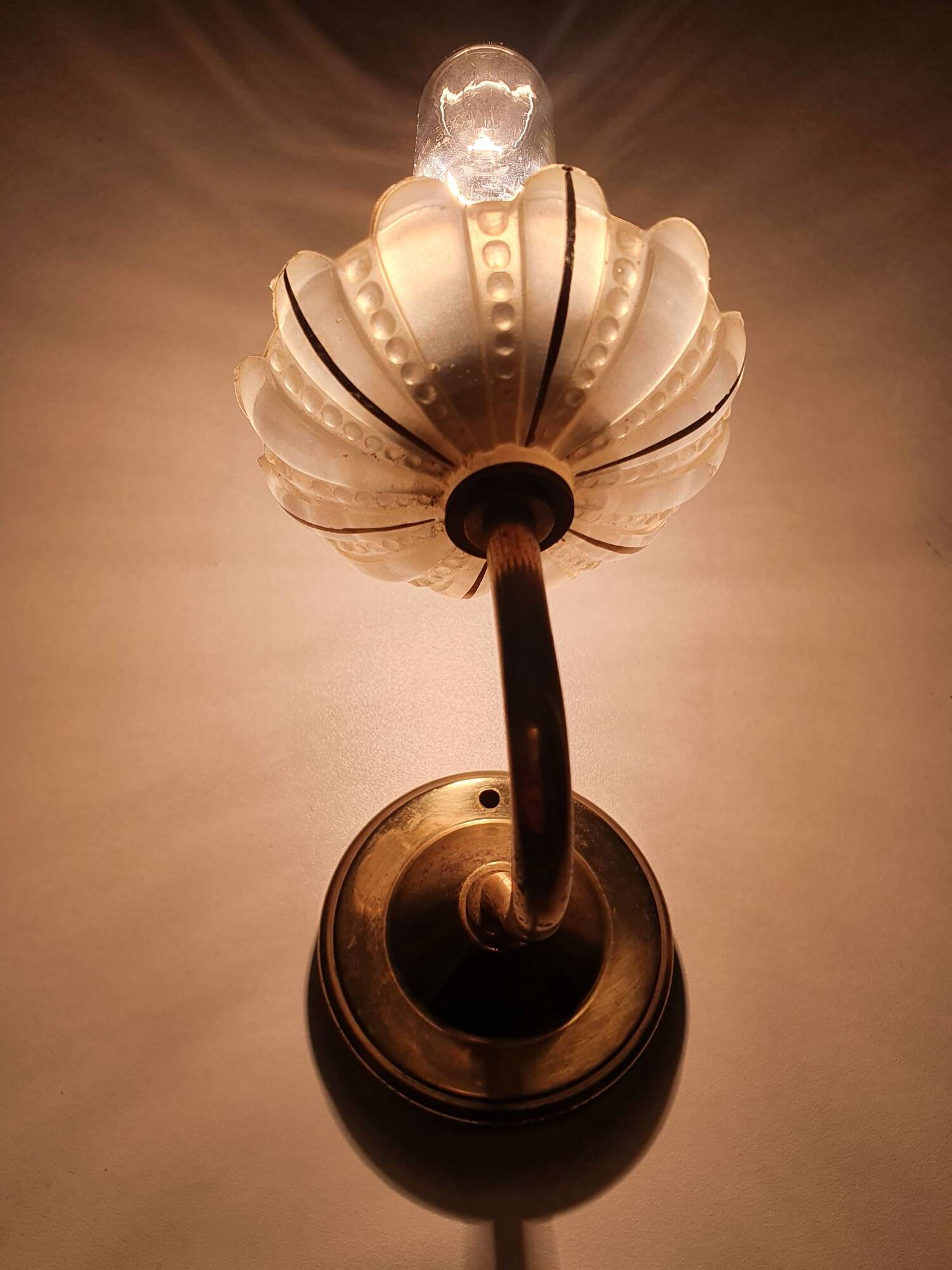 Pair of antique gold candlestick wall sconces