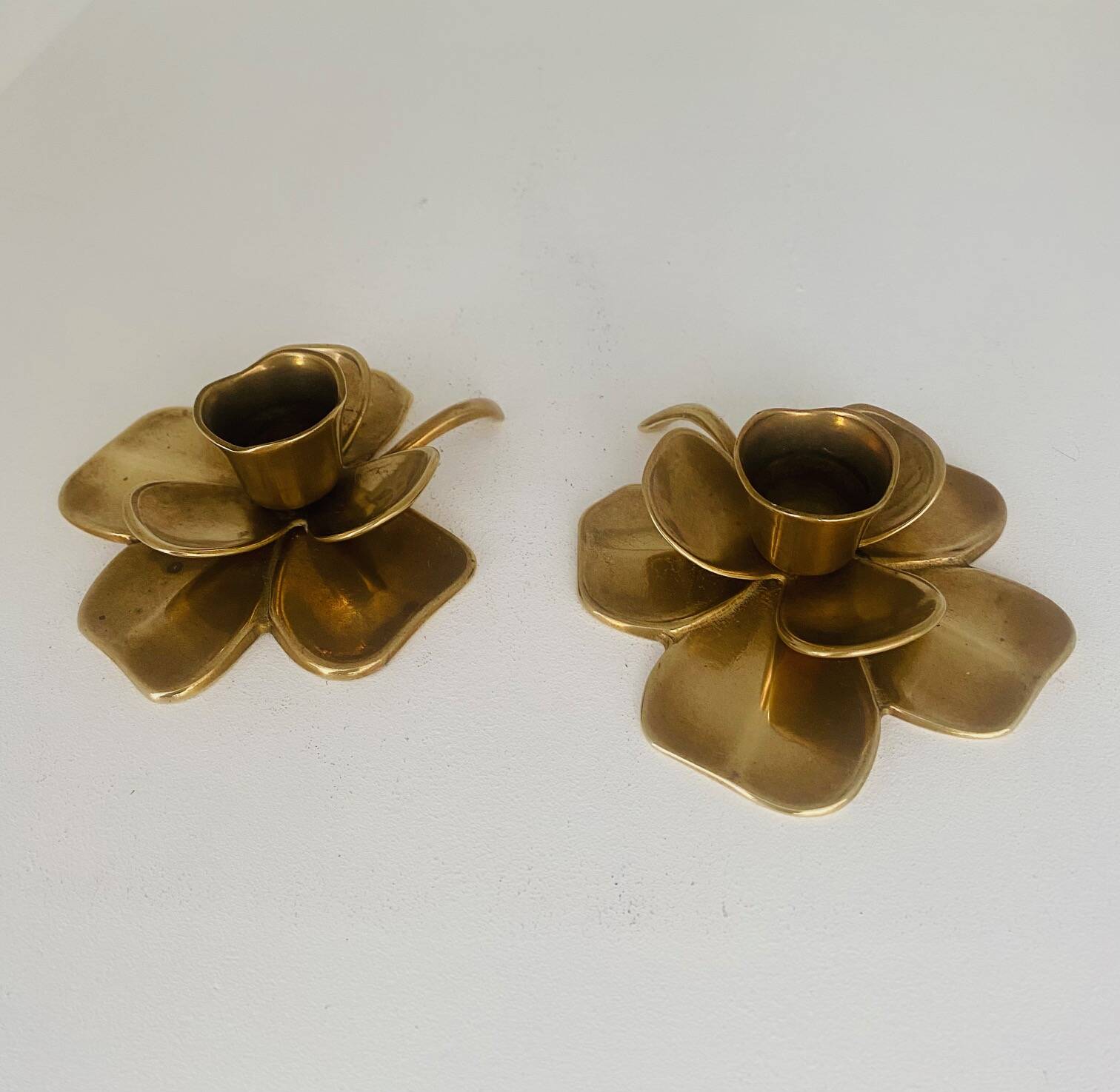 Set of 3 old brass candlesticks in the shape of flowers