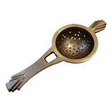 Art deco tea colander